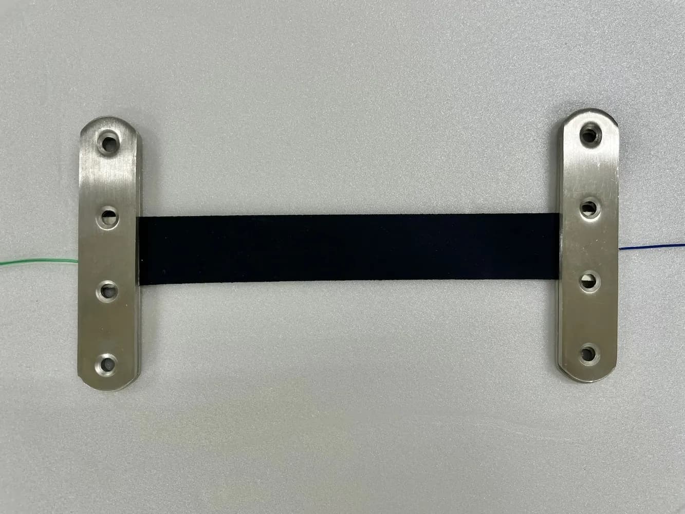 CNT sensor film mounted on a test jig